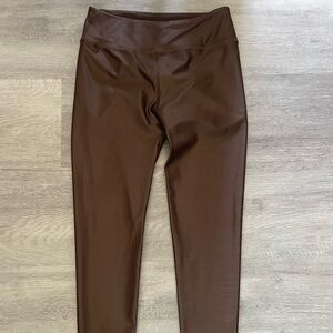 Noli size large bronze colored leggings.